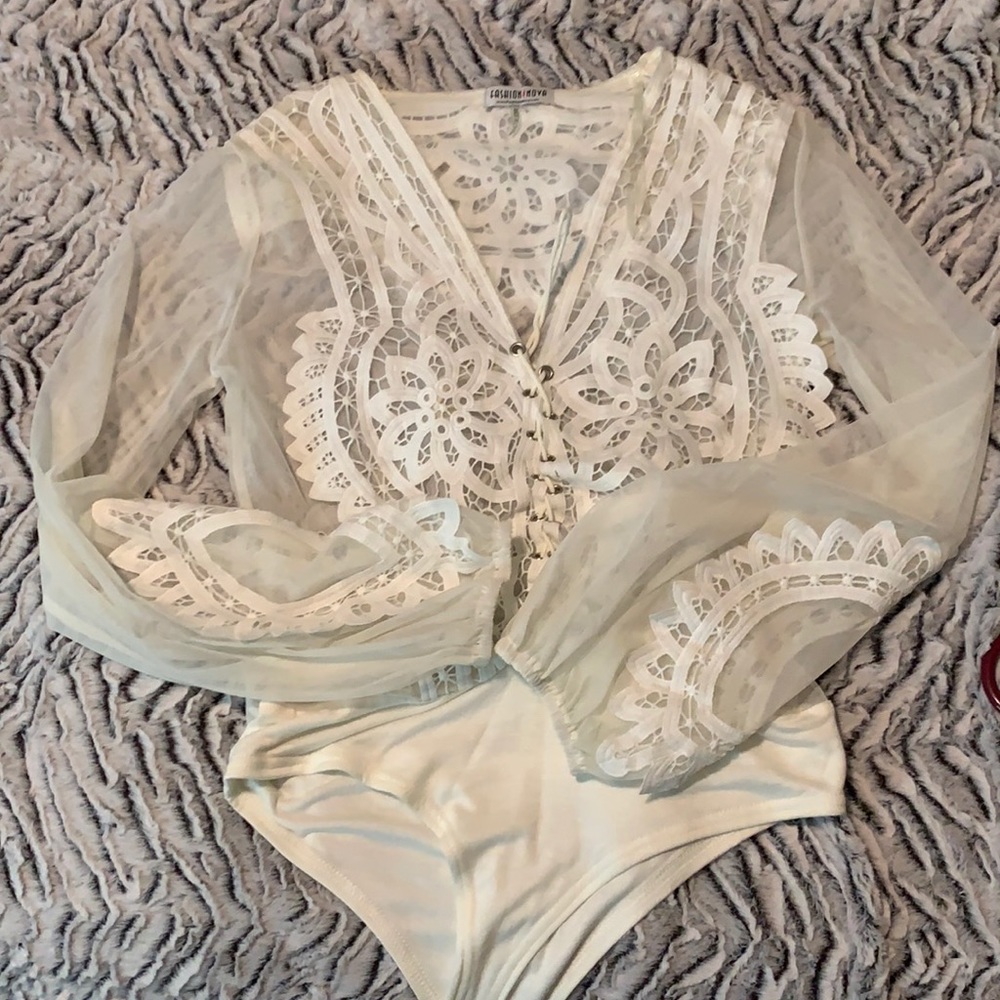 SOLD.  White see-through mesh Bodysuit